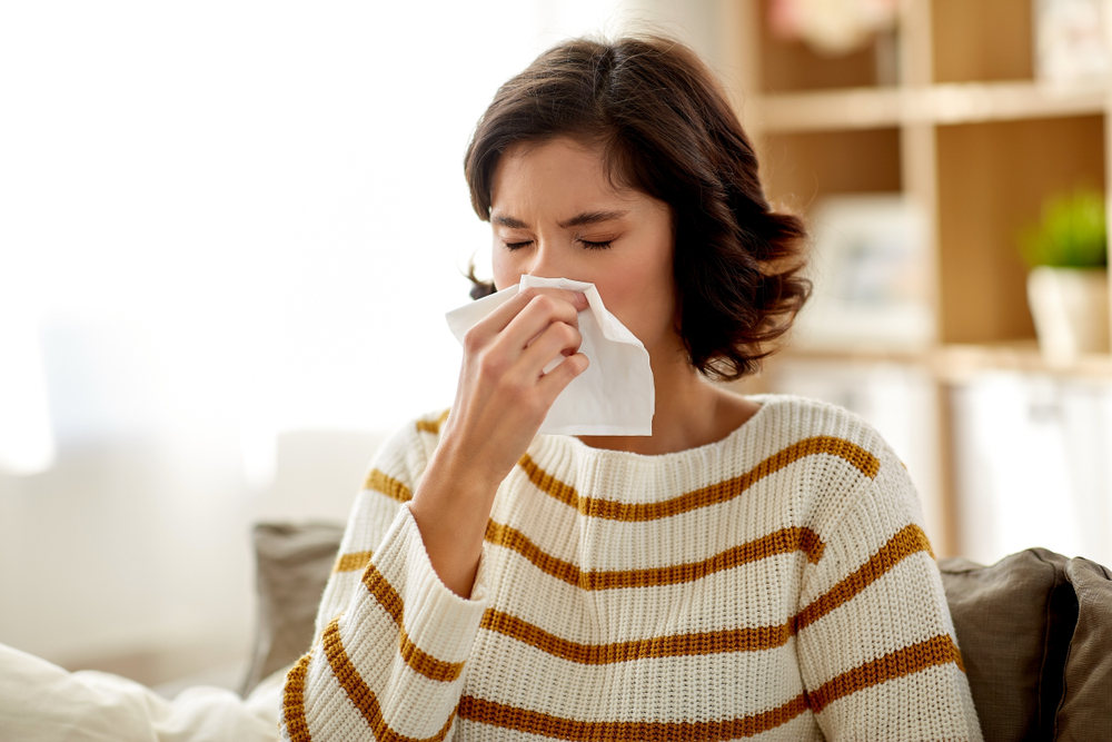 A woman with fall allergy symptoms A woman with fall allergy symptoms