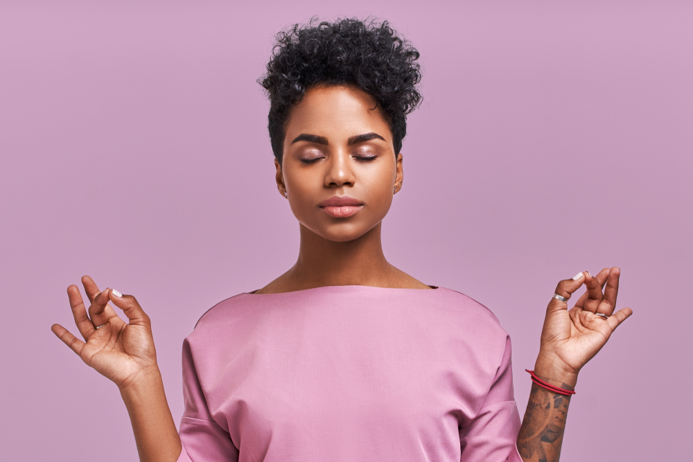 A woman learning to control her breathing to overcome her fear of needles A woman learning to control her breathing to overcome her fear of needles