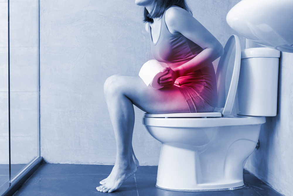 woman experiencing constipation after delivery woman experiencing constipation after delivery