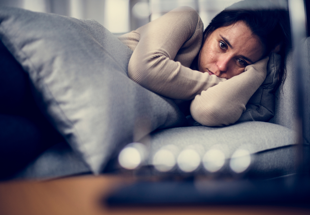 A woman feeling anxious due to smoking A woman feeling anxious due to smoking