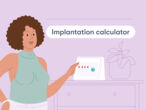Woman holding a calendar showing her period and the date of ovulation and implantation 
