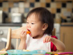 Baby eating solid food is one of the 10-month-old baby’s development and growth milestones