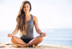 A woman practices yoga to regulate her menstrual cycle