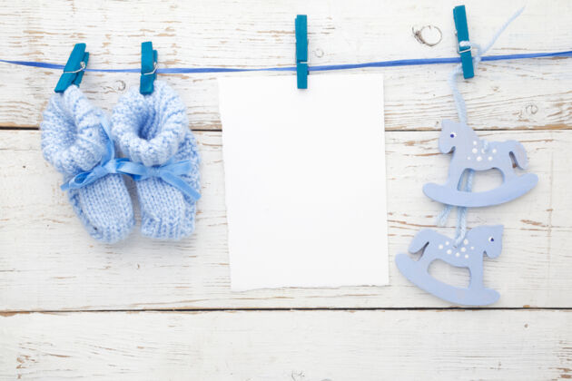 blue booties and wooden horse  blue booties and wooden horse